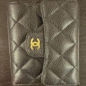 CHANEL Black Quilted Leather Card Holder with Gold Emblem